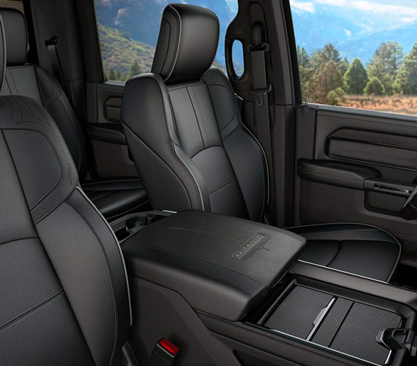 Display The front seats in a 2023 Ram 2500 Limited.