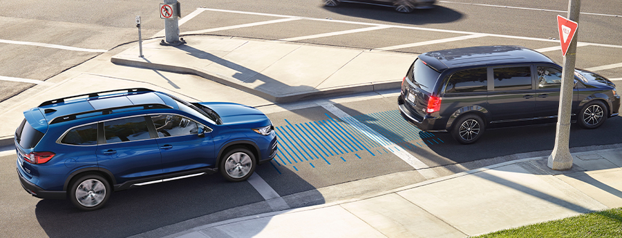 An Ascent driving down the highway with a blue graphic showing the EyeSight Drive feature