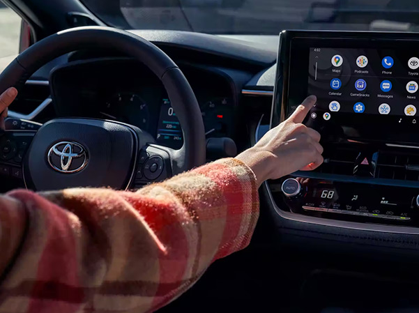 Interior view of woman using center display features