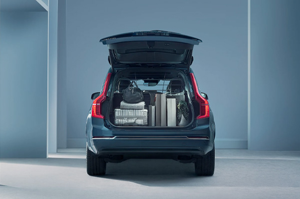 Opened trunk of the 2023 Volvo XC90 with luggage inside