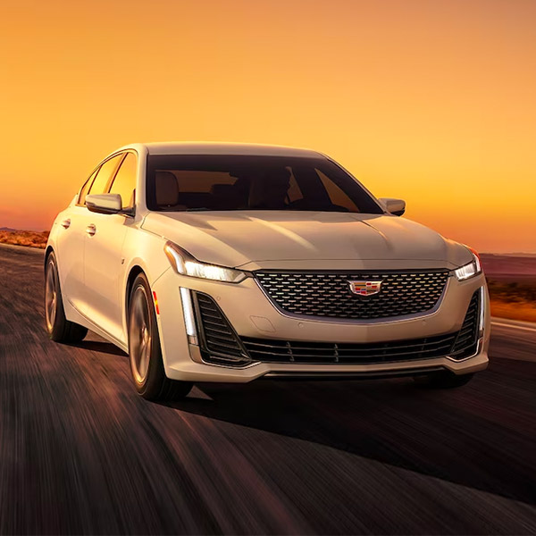 Front shot of the 2024 Cadillac CT5 driving down road