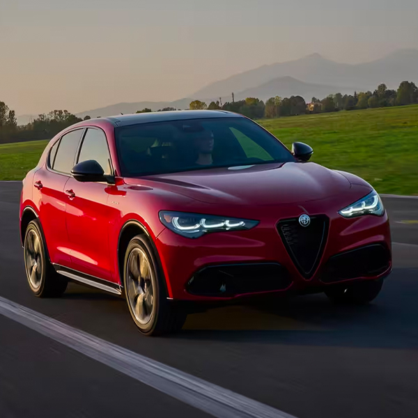 Exterior shot of an Alfa Romeo Stelvio driving.