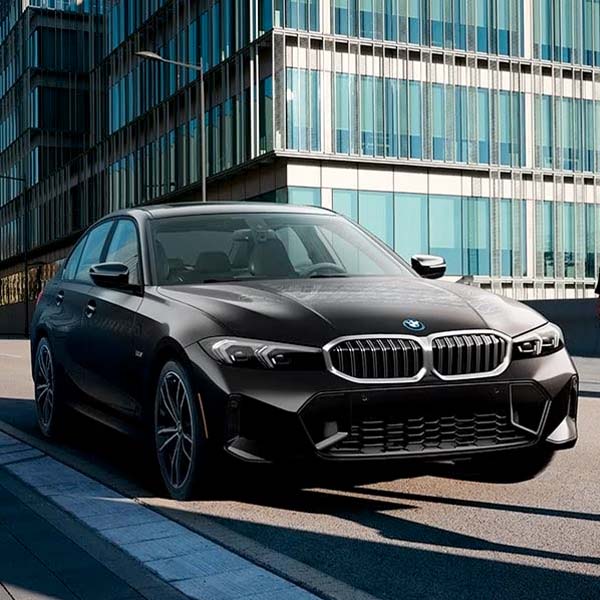 The 2024 BMW 3 Series parked on a city street