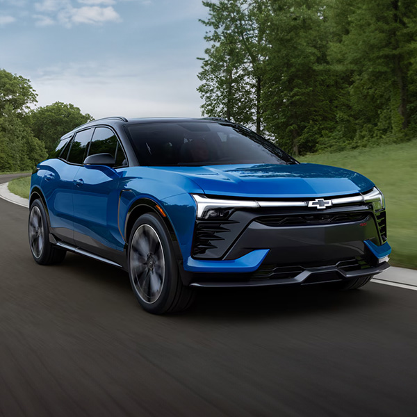 Exterior shot of a Chevrolet Blazer EV driving on a street.
