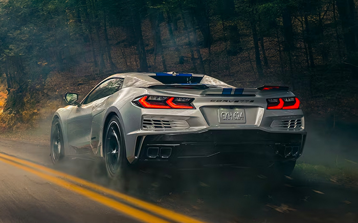 The 2024 Chevy Corvette E-Ray rear view on road