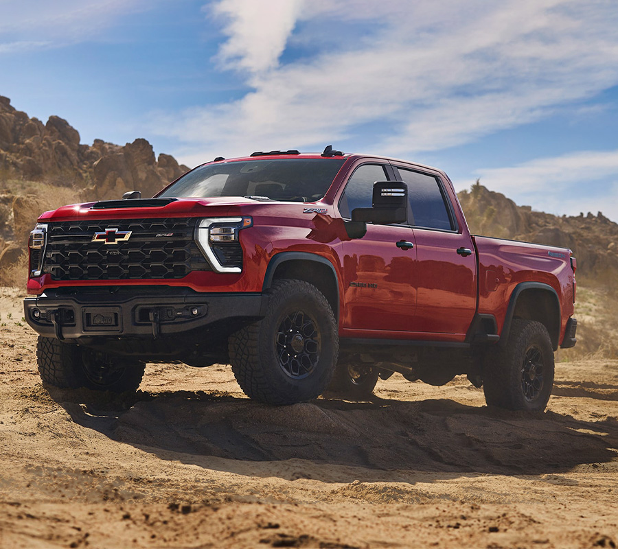 The 2024 Silverado HD Parked in an offroad dessert scene