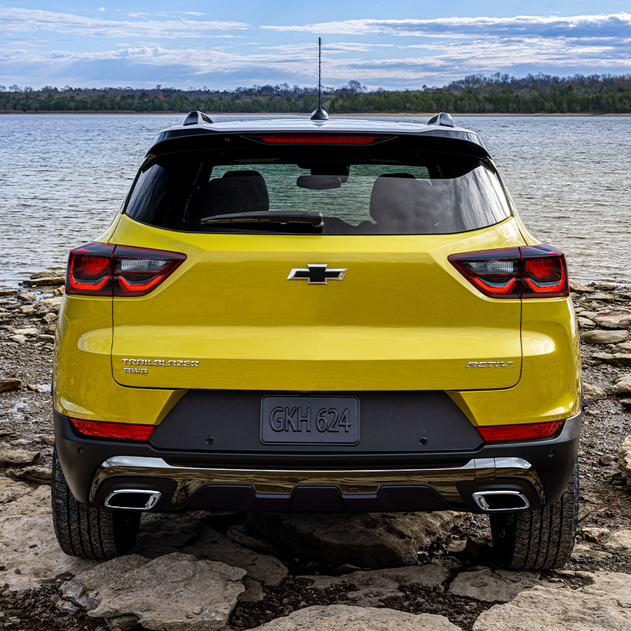 The 2024 Trailblazer Parked On a Rocky Shore with a Beautiful View of the Lake