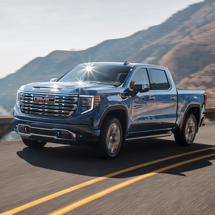 GMC Sierra 1500 driving on a road