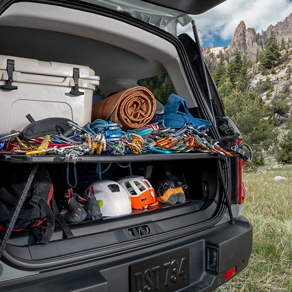 A 2024 Ford Bronco® Sport SUV showing the Cargo Management System loaded with climbing gear
