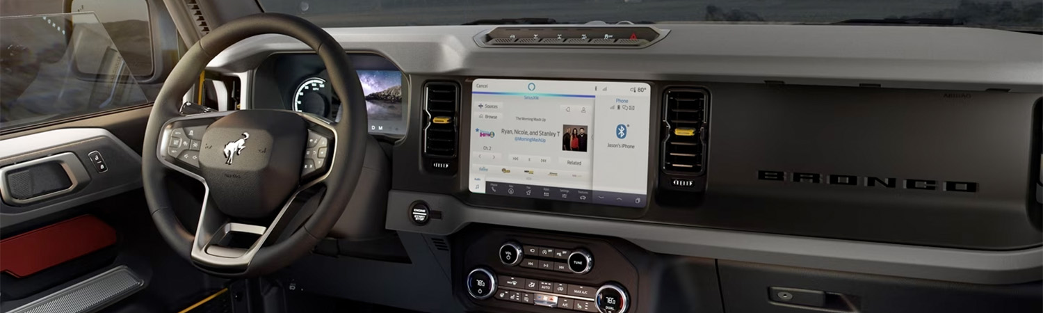Interior of 2024 Ford Bronco® SUV showing available SYNC® 4 and other available technology.