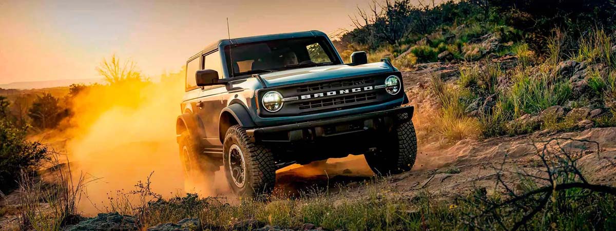 2024 Ford Bronco driving along off-road terrain
