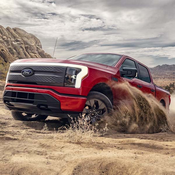 2024 Ford F-150 Lightning driving in the desert