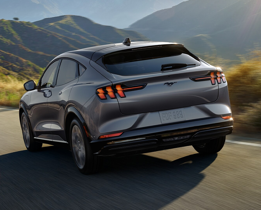 2023 Ford Mustang Mach-E® being driven on a scenic mountain highway