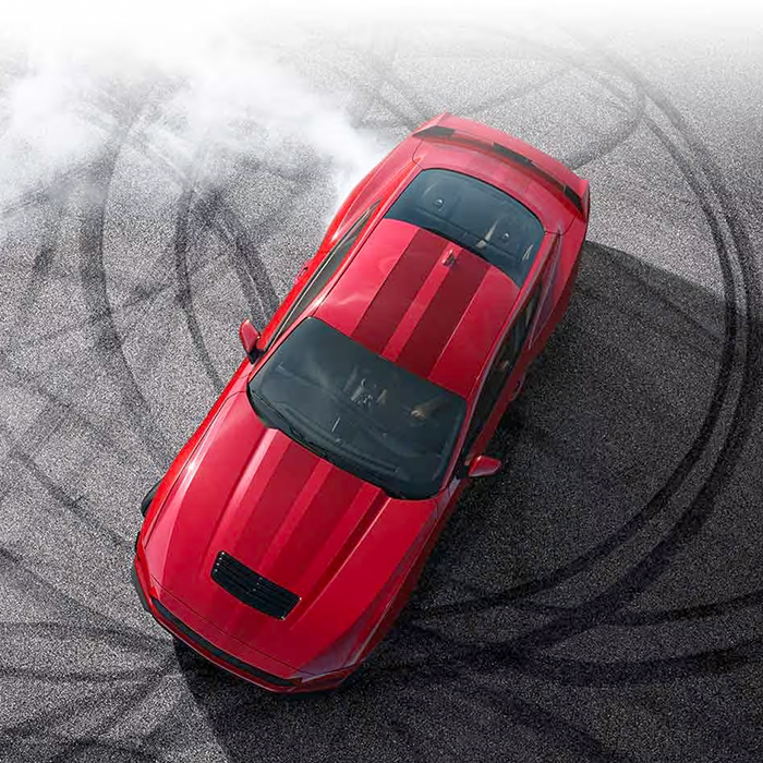 Overhead view of a 2024 Ford Mustang® model with tire tracks on pavement