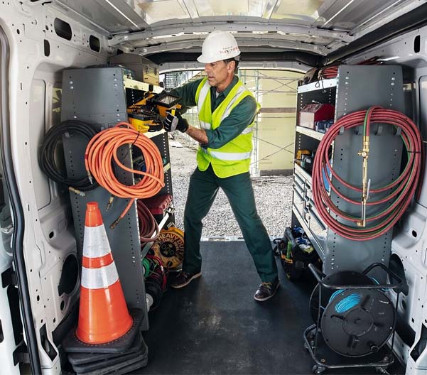 Man working inside a 2024 Ford Transit