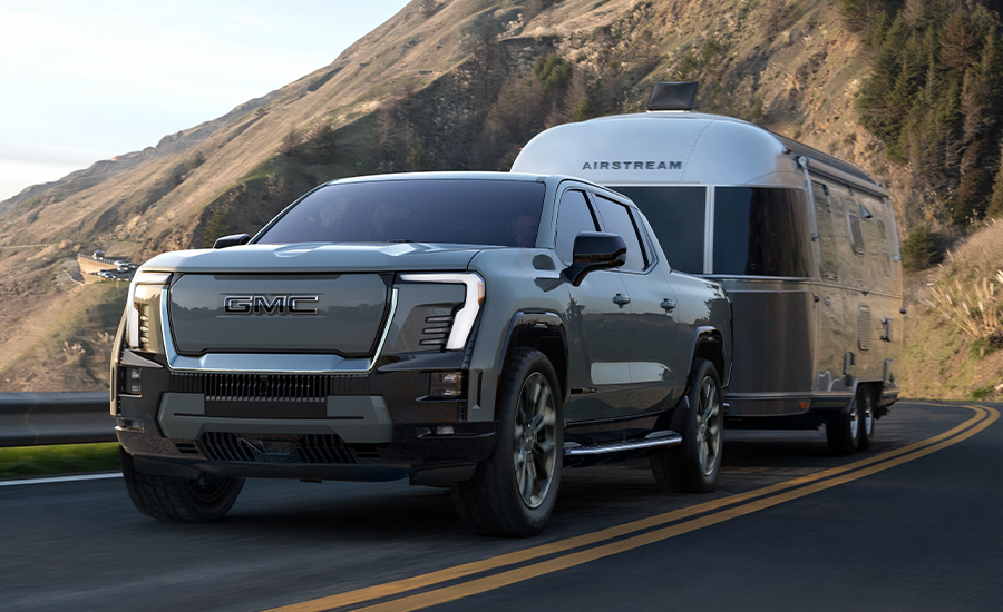 First Ever GMC Sierra EV Denali Edition 1 Hauling/towing an Airstream Camper Trailer