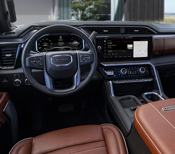 The Stylish Interior of the GMC Sierra HD Denali Ultimate with Steering Wheel & Infotainment System