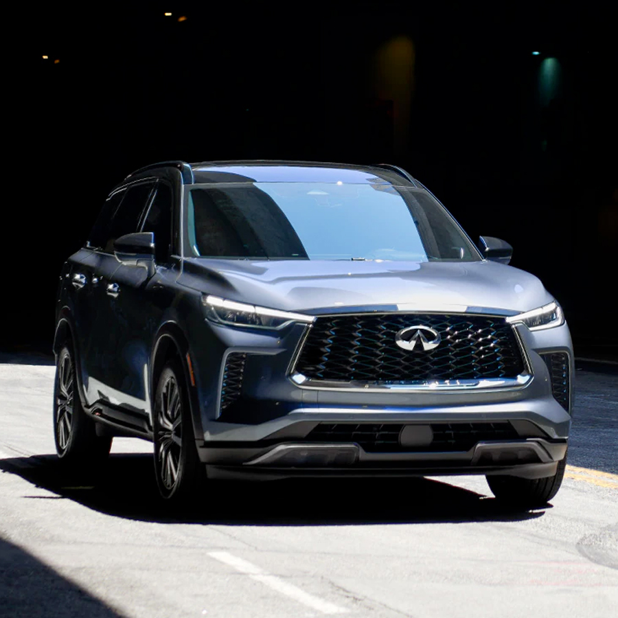 2024 INFINITI QX60 exterior shown in Moonbow Blue color