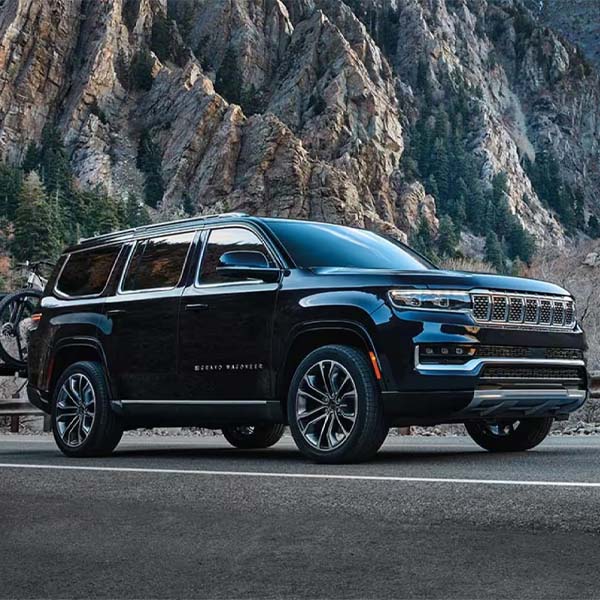 2024 GRAND WAGONEER parked on mountain highway