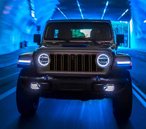 The 2024 Jeep Wrangler driving through a tunnel.