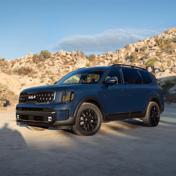 2024 Kia Telluride Parked Off-Road Near The Desert Hills Three-Quarter View