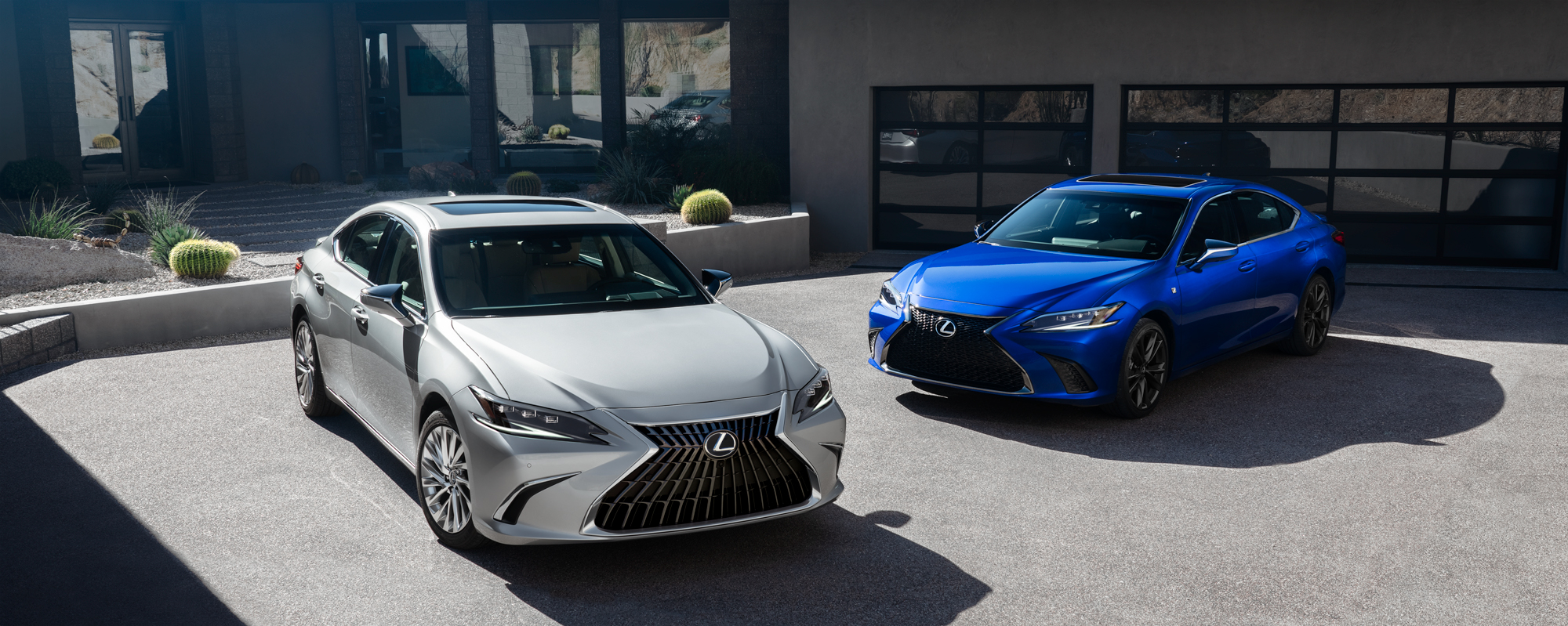Exterior of the Lexus ES Hybrid shown in Iridium and the ES F SPORT Handling shown in Ultrasonic Blue Mica 2.0.