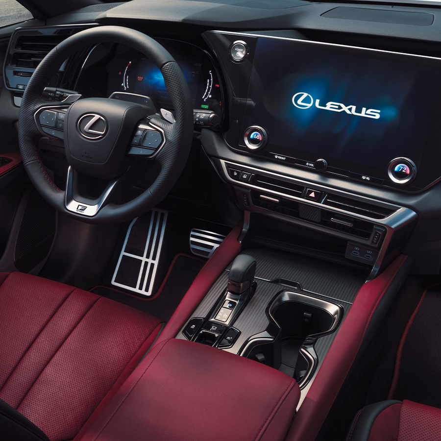 Interior of the 2024 Lexus RX F SPORT in Rioja Red showing the 14-inch multimedia display.