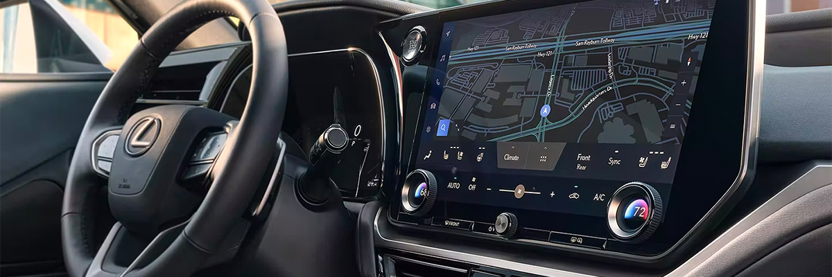 Interior shot of the Lexus TX 14-inch touchscreen display with Lexus Interface, shown in Black.