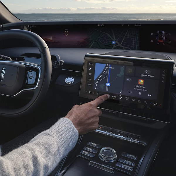 A 2024 Lincoln Black Label Nautilus® SUV is being driven on a desert highway