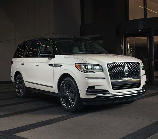 2024 Lincoln Navigator exterior shot in front of building at night