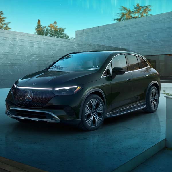Front 3/4 shot of the 2024 Mercedes-Benz EQE SUV parked.
