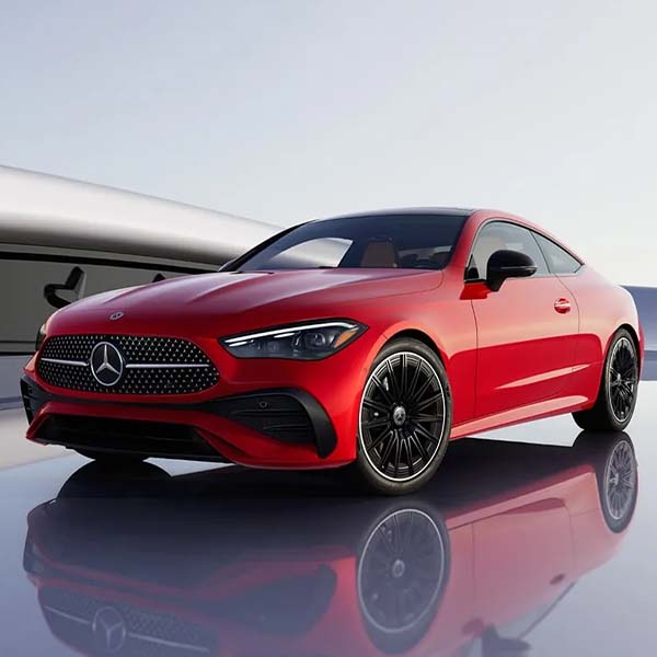 Exterior shot of a 2024 Mercedes-Benz CLE parked outdoors on a reflective surface.