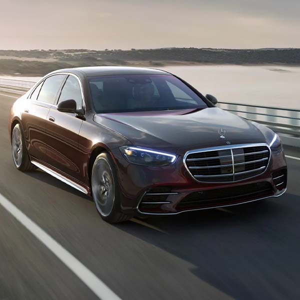 2024 Mercedes-Benz S-Class driving on a bridge