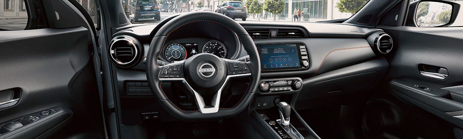2024 Nissan Kicks steering wheel and touchscreen display