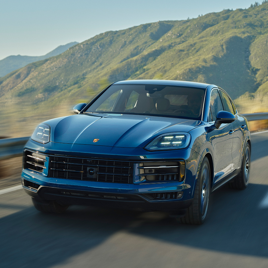 2024 Porsche Cayenne S Coupe front view driving along highway