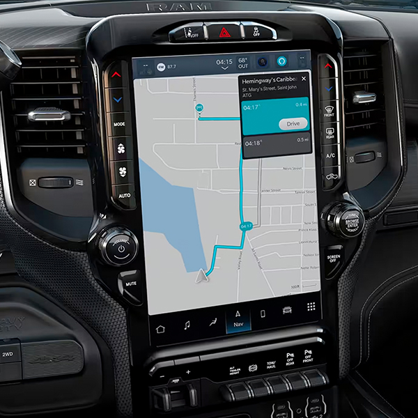 A close-up of the Uconnect touchscreen in the 2024 Ram 3500 Limited, displaying a navigation map.