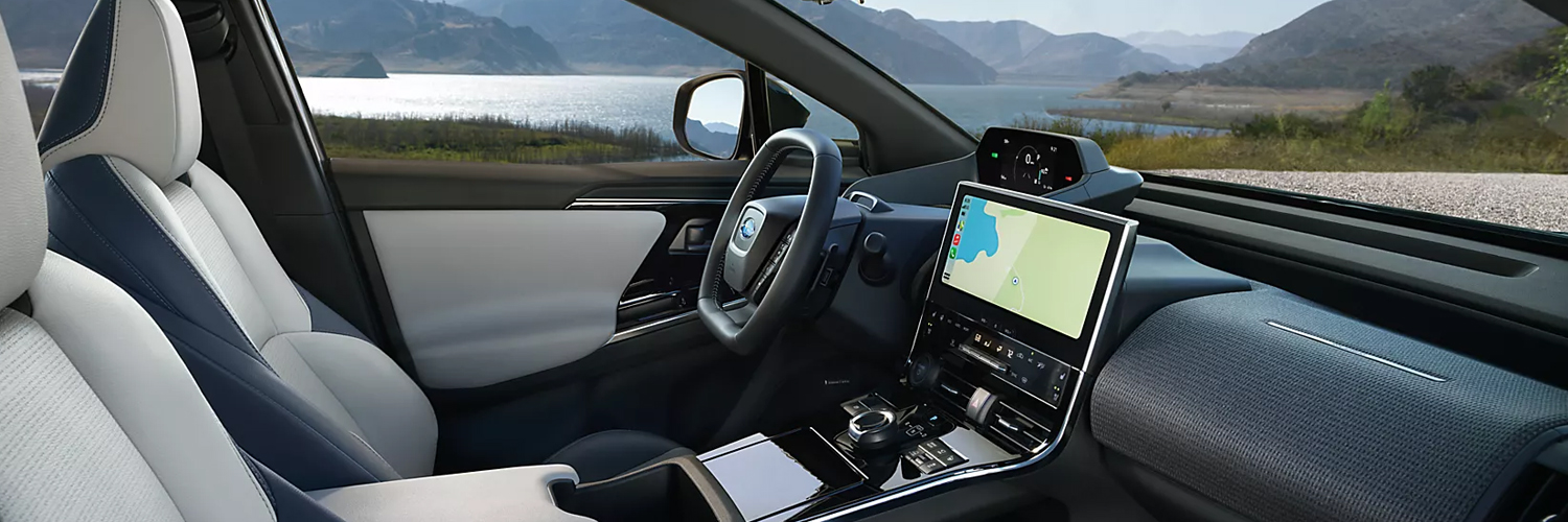 The front cockpit and 12.3-inch touchscreen in the dash of the 2024 Subaru Solterra electric SUV.