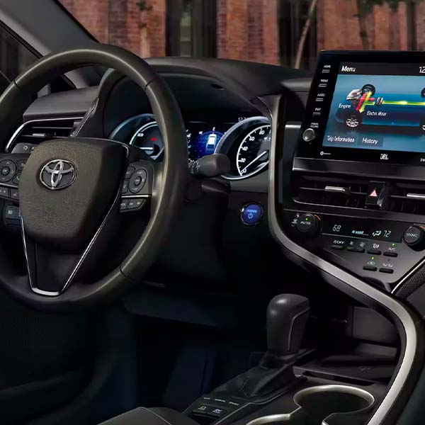 Interior shot of a 2024 Toyota Camry Hybrid cockpit.