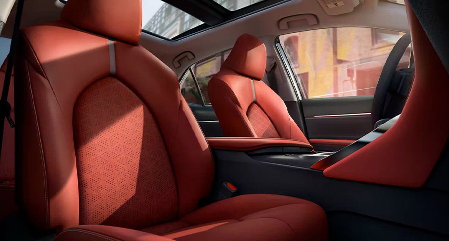 XSE V6 interior shown in available Cockpit Red leather trim. Prototype vehicle shown with options using visual effects.