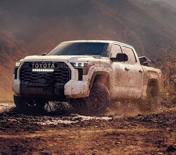 2024 Toyota Tundra TRD Pro CrewMax kicking up mud offroading