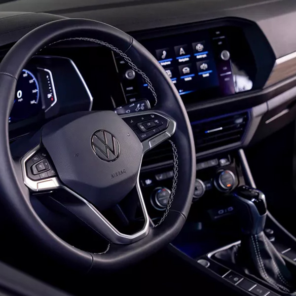 View of the available leather-wrapped, heated multi-function steering wheel.