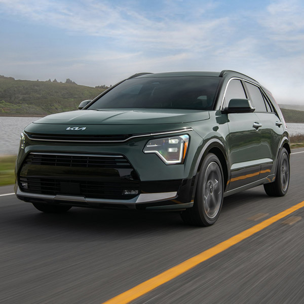Front 3/4 shot of the 2025 Kia Niro Hybrid driving down road