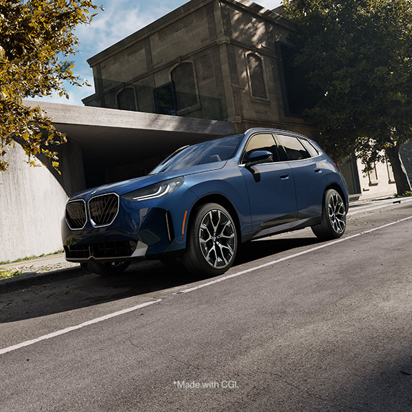 Side shot of the 2025 BMW X3 parked on the side of the road