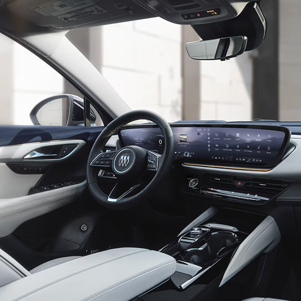Wide Interior View of the Steering Wheel and Digital Dashboard in a 2025 Buick Envision Avenir Luxury Compact SUV