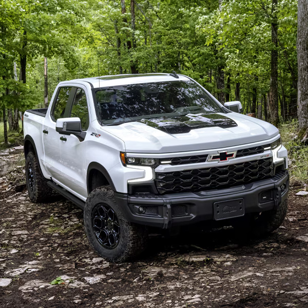 The 2025 Silverado parked offroad on dirt