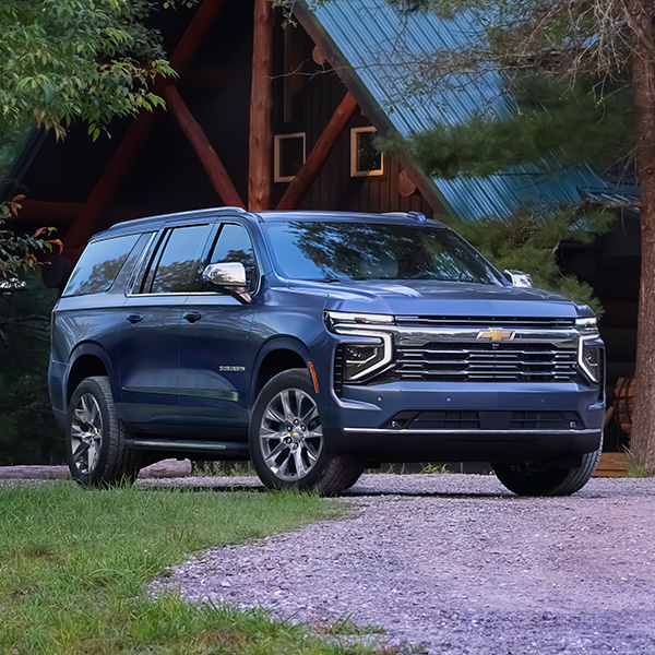 View of a 2025 Chevy Suburban parked in a driveway