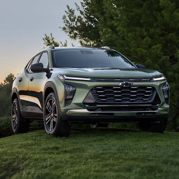 Chevy 2025 Trax Parked on a Grassy Hill.