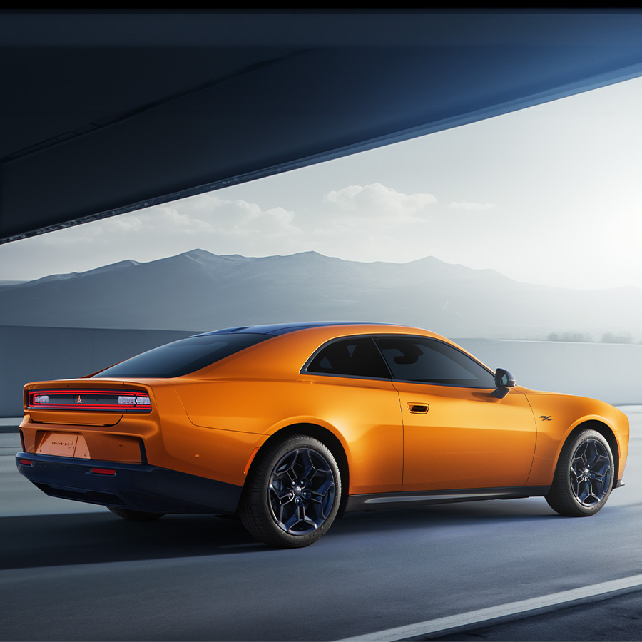 Dodge Charger Daytona R/T shown in Peel Out with available Blacktop Package.
