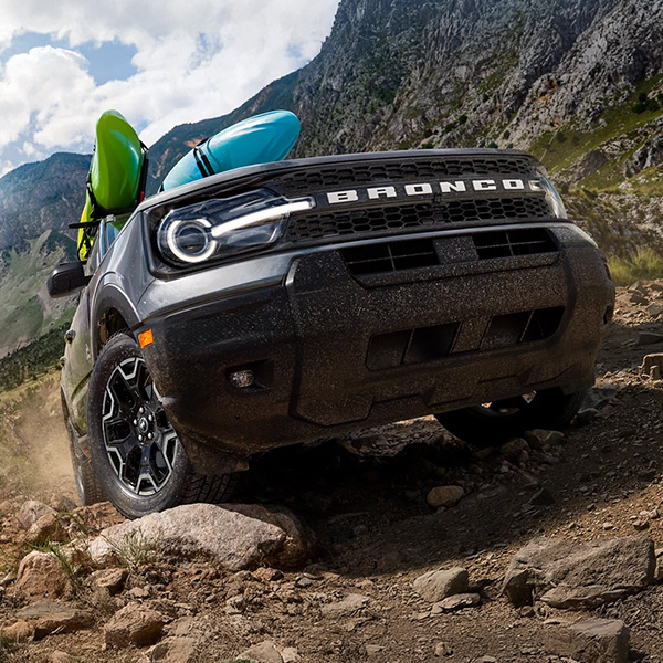 2025 Ford Bronco Sportˆ being driven on rocks