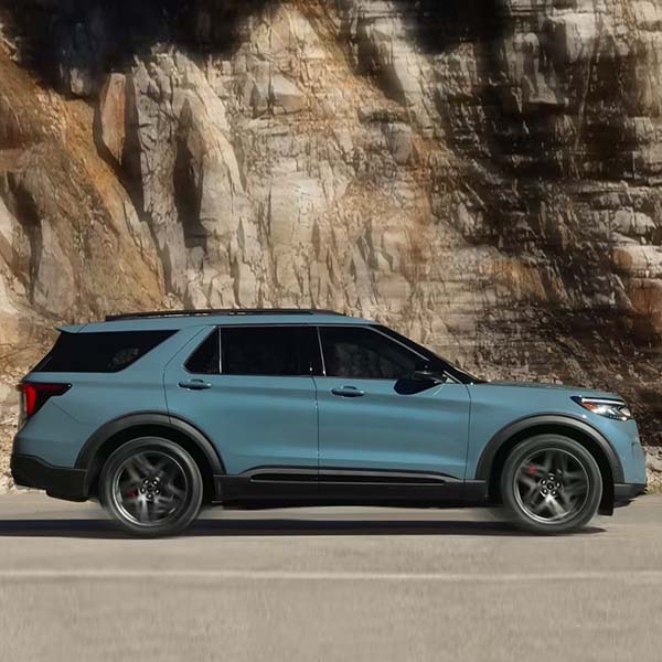2025 Ford Explorer driving along cliffs in the mountains